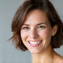 Client Sarah J. smiling confidently